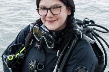 Photo of Divematser Stephanie Moulton in a dry suit